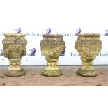 Three composite stone 'Summer Flowers' garden planters by Bernard Pannell, signed to interiors,