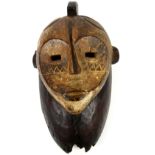 Fang tribal mask/helmet, with good positive signs of age from tribal use, carved wood, traces of