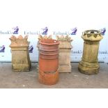 Three terracotta chimney stacks, H.67cm, together with two other chimney stacks, H69cm and H79cm (3)