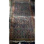 Persian rug with all over Herati design, within floral bands, 260 x 118cm