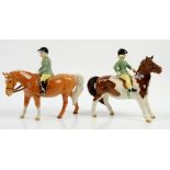 Pair of Beswick figures, a skewbald pony with girl rider and a Palomino with boy rider, each