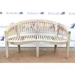 Teak garden banana bench of slatted construction with bowed back-rest and serpentine front, H89 x