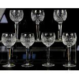 Waterford crystal faceted stem wine glasses, five matching and two of a different design, h19cm