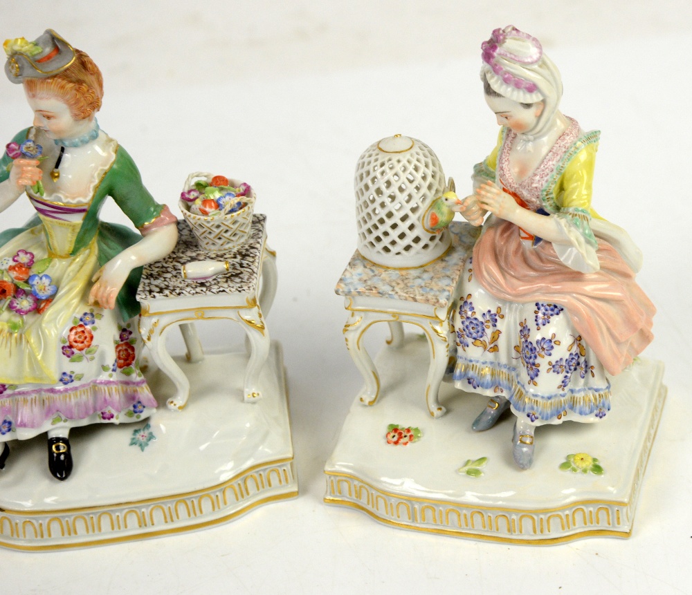 AMENDED DESCRIPTION Three Meissen figure groups each one modelled as a lady seated at a table, - Image 2 of 4