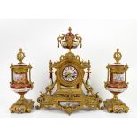 19th century French gilt metal clock garniture, the clock with painted dial with Roman numerals