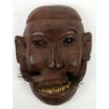 20th century Indonesian dance mask, complete with inset bead eyes (one missing), teeth and