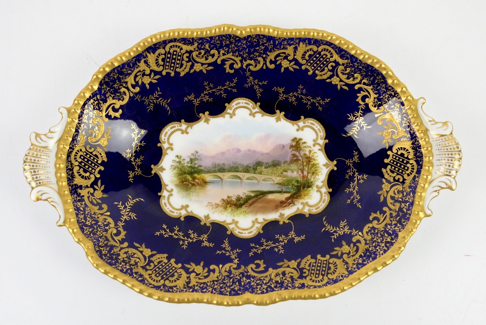 Coalport oval two handled dish in cobalt with gilt decoration, the centre hand-painted with a - Image 2 of 3