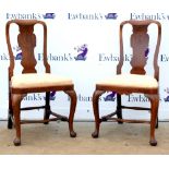 Pair of Queen Anne style walnut dining chairs with drop in seats, turned stretchers and shaped splat