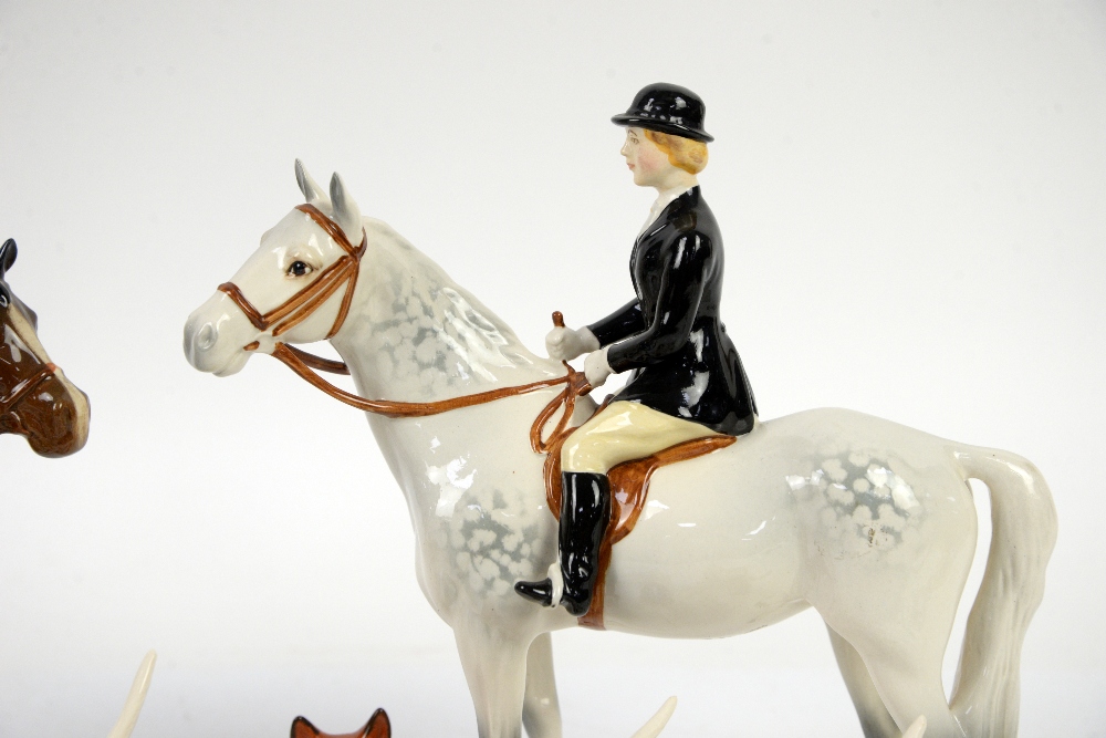 Beswick Huntsman and Huntswoman, 20cm, together with 9 foxhounds and two foxes - Image 2 of 5