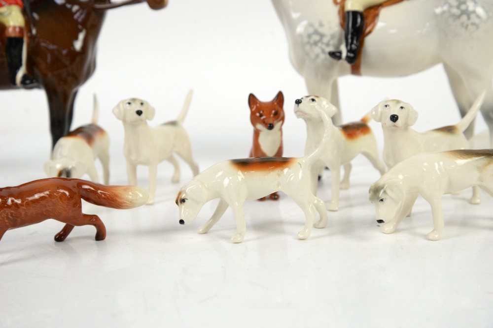 Beswick Huntsman and Huntswoman, 20cm, together with 9 foxhounds and two foxes - Image 4 of 5