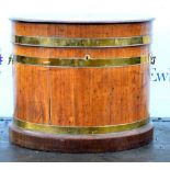 19th century mahogany oval brass bound wine cooler, the hinged top to reveal metal inset. 54H x