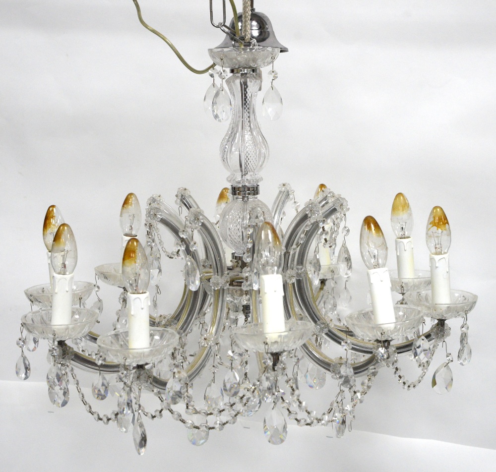 Italian cut glass ten branch chandelier, with sweeping branches and cut glass drops and flowers,