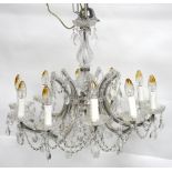 Italian cut glass ten branch chandelier, with sweeping branches and cut glass drops and flowers,