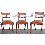 Early 19th century set of six mahogany and ebony line inlaid dining chairs with drop in seats and