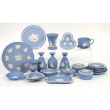 A quantity of Wedgwood blue jasperware to include trinket boxes, vases and dishes