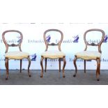 Set of six Victorian walnut balloon back chairs on cabriole front supports