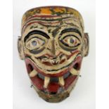 Mid 20th century Sri Lankan polychrome Hanuman mask, vividly decorated in traditional style, W18.5cm