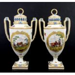 A pair of two handled Continental porcelain urns and covers with central cartouches painted with