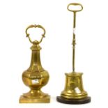 Two Victorian brass door stops.