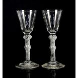 Two 18th century air twist glasses, with double knop stems, on round feet, 16cm high Glass 1: