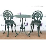 Green painted metal garden table, with pierced scrolling floral design, H73cm Diameter 69cm,