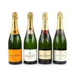 Four bottles of champagne, to include one bottle of Pierre Darcys Brut Champagne, one bottle of Moet