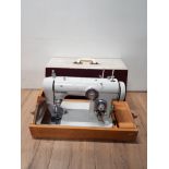 VINTAGE NEW HOME SEWING MACHINE IN ORIGINAL CASE