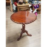 CARVED MAHOGANY PEDESTAL OCCASIONAL TABLE WITH ROPE EDGING