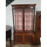 FLAMED MAHOGANY DISPLAY CABINET