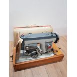 VINTAGE JONES SEWING MACHINE IN ORIGINAL CASE