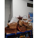 A VERY LARGE AMOUNT OF WICKER ITEMS INC BASKETS LAUNDRY BASKET ETC