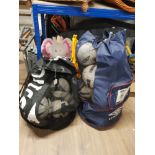 2 BAGS CONTAINING FOOTBALLS