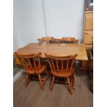 PINE KITCHEN TABLE TOGETHER WITH A SET OF 4 PINE CHAIRS