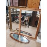 BEVELLED OVAL MIRROR TOGETHER WITH ORNATELY FRAMED MIRROR AND A PINE FRAMED MIRROR