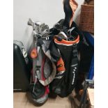 2 GOLF BAGS BOTH CONTAINING CLUBS
