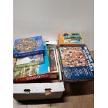 A SUBSTANTIAL AMOUNT OF JIGSAW PUZZLES