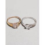 2 SILVER AND CZ SOLITAIRE RINGS