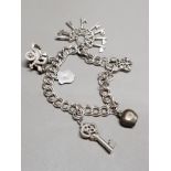 SILVER CHARM BRACELET WITH 6 CHARMS 25.9G