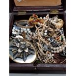 BOX CONTAINING MISCELLANEOUS COSTUME JEWELLERY MAINLY NECKLACES AND BROOCHES