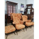 A 5 PIECE ERCOL SUITE COMPRISING 2 SEATER SETTEE 2 CHAIRS AND 2 FOOTSTOOLS