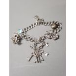 SILVER CHARM BRACELET WITH 6 CHARMS 25.9G