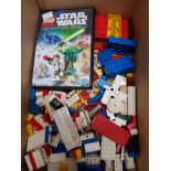 A BOX CONTAINING LEGO AND LEGO STAR WARS FILM