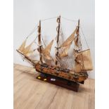 LARGE HAND CRAFTED WOODEN MODEL OF A SHIP ON STAND L72CM X H53CM