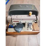 VINTAGE JONES SEWING MACHINE WITH ORIGINAL CARRY CASE