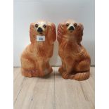 A PAIR OF GENUINE STAFFORDSHIRE DOGS