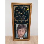 JOHN LENNON 1940 TO 1980 BATTERY OPERATED WALL CLOCK IN A GILT FRAME