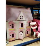 A PINK DOLLS HOUSE TOGETHER WITH A PINK PRAM