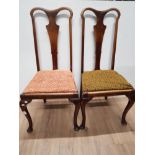 A PAIR OF RE-UPHOLSTERED CHAIRS