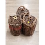 3 TWIN HANDLED WICKER COVERED FLAGONS