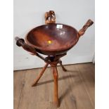 UNUSUAL AFRICAN STYLE WOODEN FRUIT BOWL ON CARVED FOLDING ELEPHANT STAND